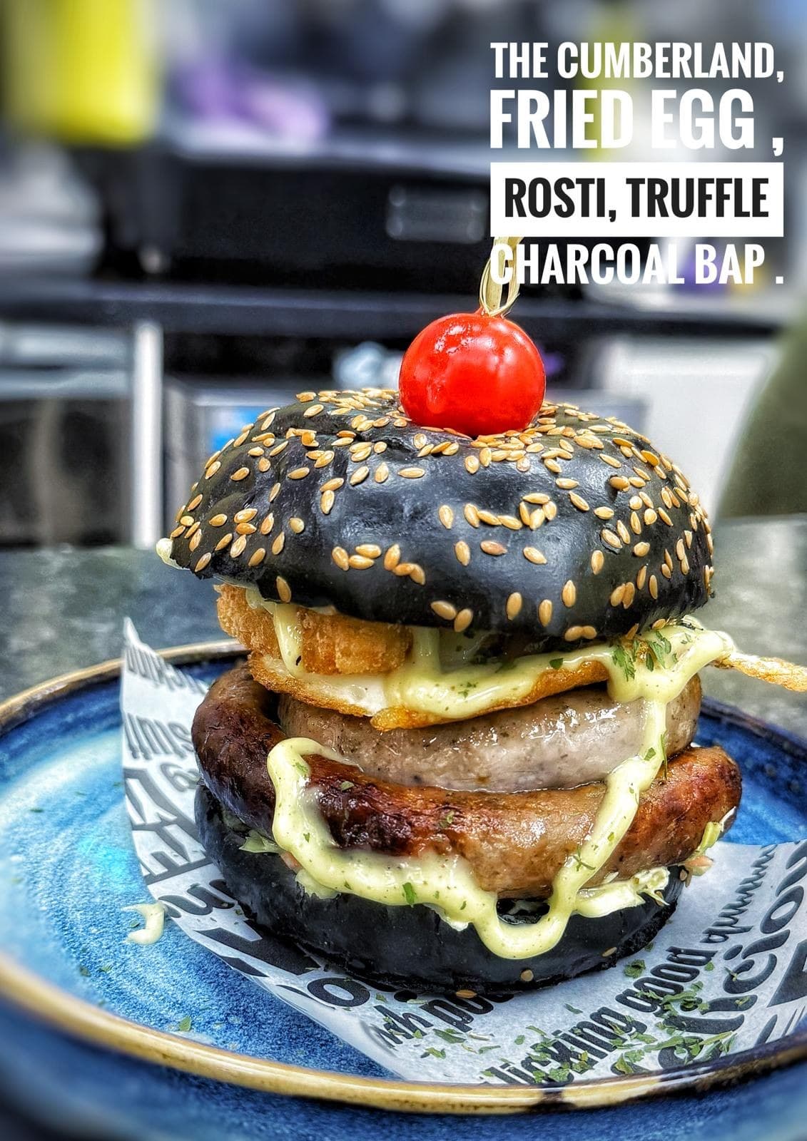 Cumberland charcoal bap with fried egg and rosti