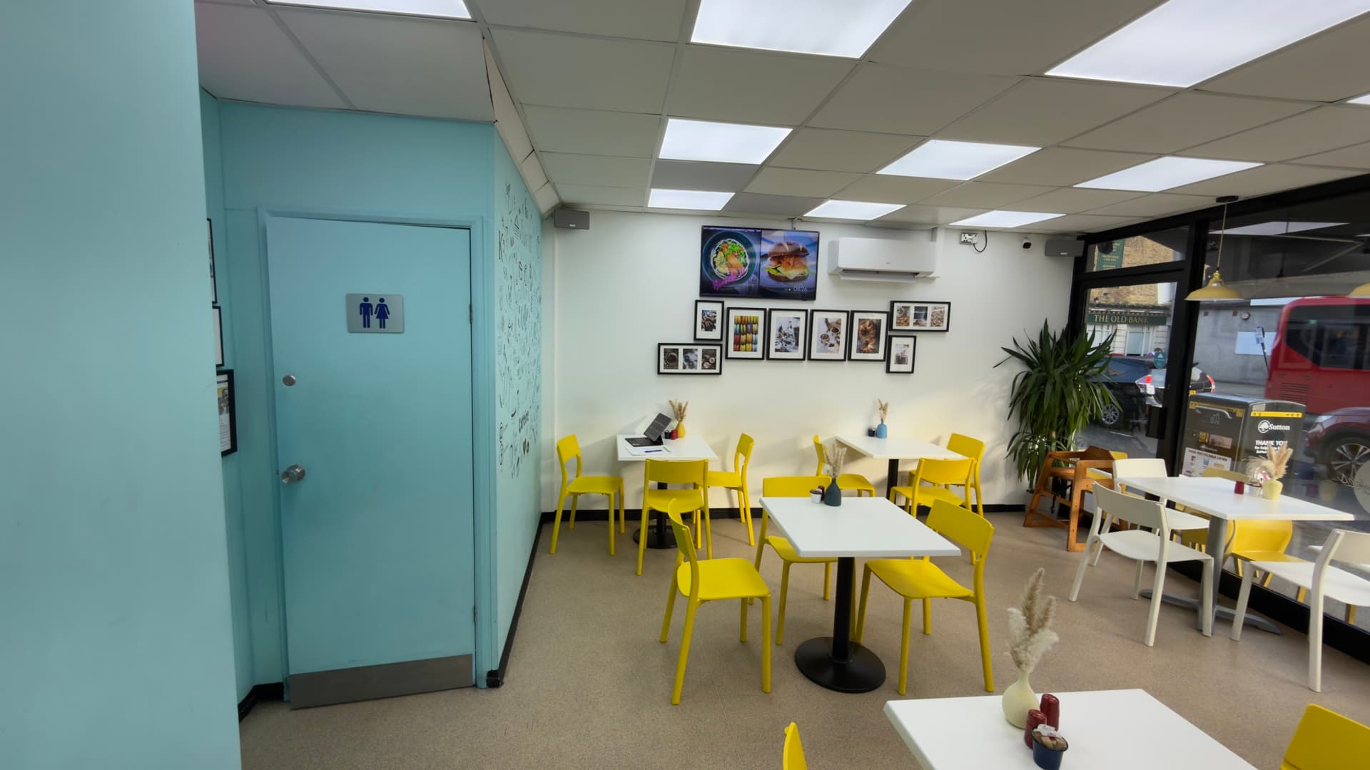 LA Cafe interior before refurbishment — the original blue-accented cafe room