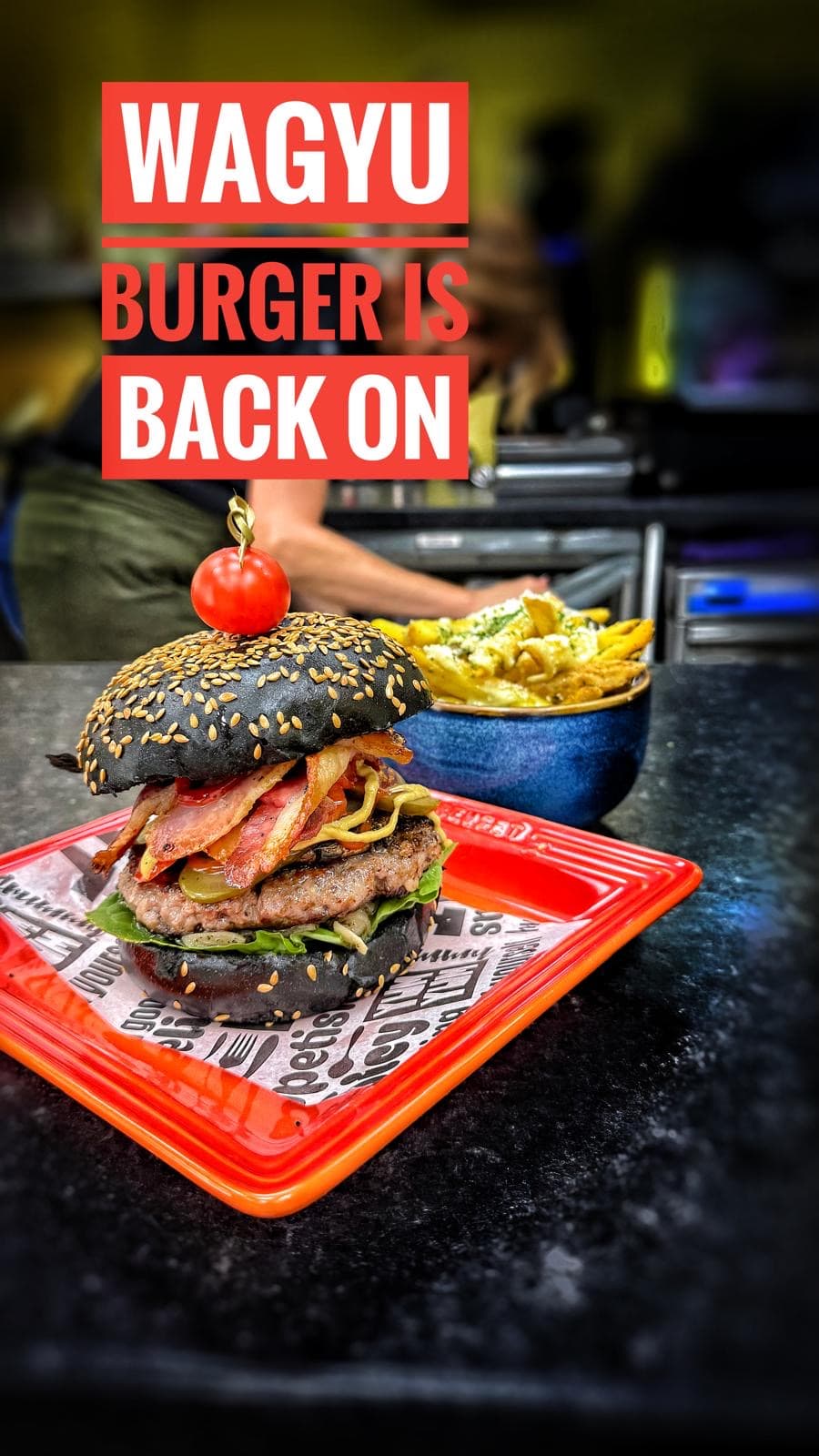 Wagyu burger on charcoal bun